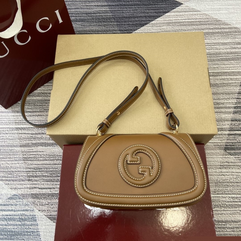 G*u*i satchel bags